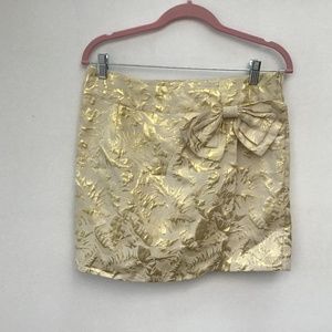 Mini skirt ivory and gold with waist bow